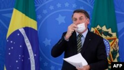El presidente brasileño, Jair Bolsonaro, entre los cinco presidentes de la región participantes en el cónclave del clima.